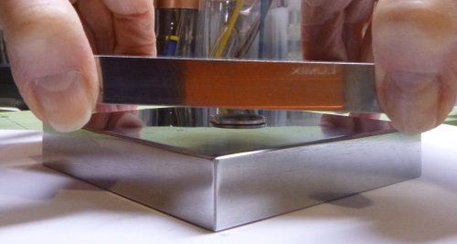 Judy Larson's Flattening Metal Pieces - Method 2 (square wire ring shown), Metalwork, , Flip the metal piece over and repeat the process if needed